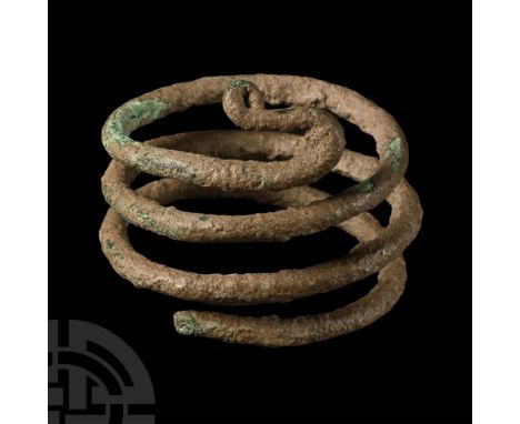 1st-2nd century A.D.. Round-section rod with tapered ends, one reversed and with a loop finial.  23 grams, 41 mm (1 5/8 in.).