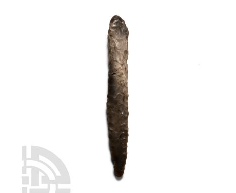 Neolithic Period, 4,000-2,000 B.C.. Narrow lentoid-section blade with remains of cortex to the base; repaired. Cf. MacGregor,