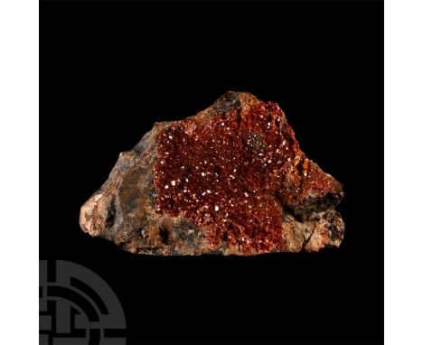A large specimen displaying brownish red, blood-red and greyish colours, collection number 283.  262 grams, 92 mm (3 5/8 in.)