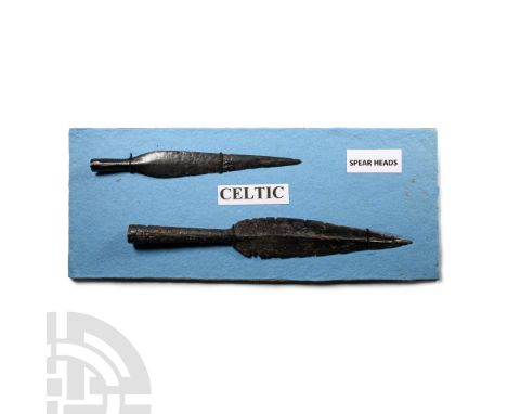 Circa 2nd century B.C.-1st century A.D.. Comprising two spearheads, each with a split socket and leaf-shaped blade, shallow m