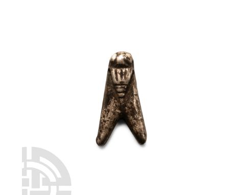 Late Period, 664-332 B.C.. Formed as a fly with long triangular wings and domed eyes. Cf. Andrews, C., Amulets of Ancient Egy