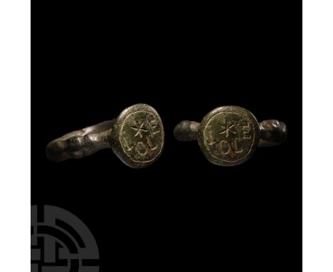 15th-16th century A.D.. The shoulders fashioned as beast-heads, flared disc bezel with border and enigmatic 'IOLE' inscriptio