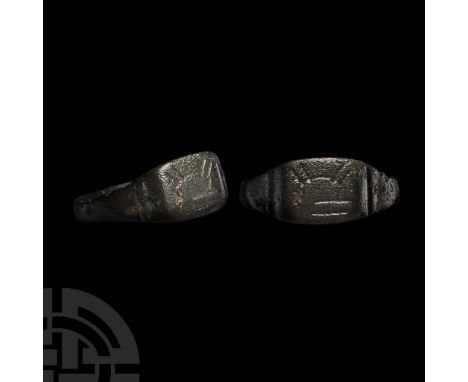 Circa 14th-15th century A.D.. Comprising a slender shank and stepped shoulders, rectangular bezel with incised zoomorphic mot