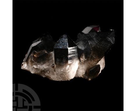 Consisting of very large, almost black crystals, collection number 607, with an old Geologisch Centrum label.  523 grams, 10 