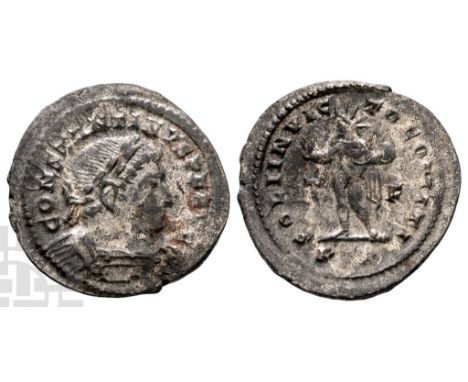 AD 307/310-337.. CONSTANTINVS P F AVG, laureate and cuirassed bust to right / SOLI INVICTO COMITI, Sol standing to left, rais