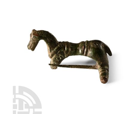 Circa 2nd century A.D.. Formed as a standing horse, the hindlegs forming crossbar, tail forming hinged pin, forelegs forming 