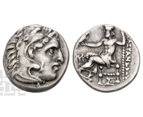Struck circa 290-275 BC.. Head of Herakles to right, wearing lion skin headdress, paws tied beneath chin / ??????????, Zeus s