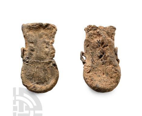 14th-15th century A.D.. Each with lateral loops and low-profile rosette detailing to the bulb.  83 grams total, 51-52 mm (2 i