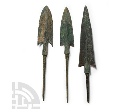 Circa 12th-10th century B.C.. Each with a sturdy square-section tang, broad barbed head with midrib. See Khorasani, M.M., Arm