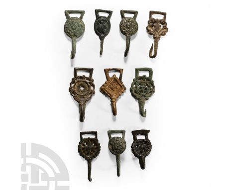 16th century A.D.. Mainly rosette and openwork scroll types; many of these objects are published in the Detector Finds book s