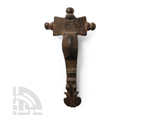 Later 5th-6th century A.D.. With three radiating lugs to the headplate and equine foot with flared nostrils. Cf. MacGregor, A