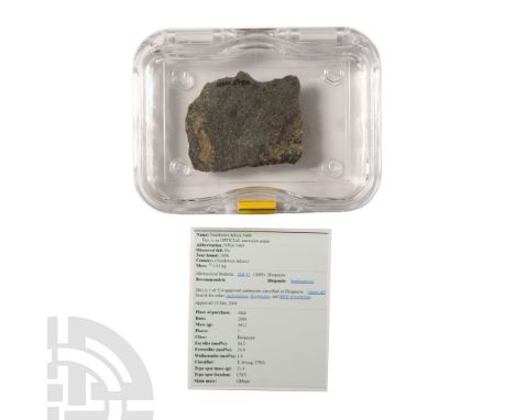 Found 2008 A.D.. A cut slice of scarce achondrite from the diogenite group recorded as: Northwest Africa 5480; displayed in a