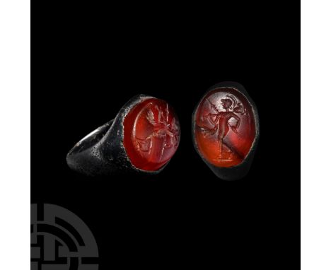 2nd-3rd century A.D.. With tapering shoulders, inset ellipsoid carnelian intaglio of Mars advancing wearing a Corinthian helm