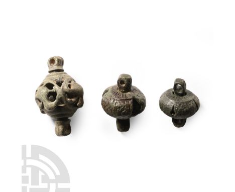 11th-12th century A.D.. Elaborate swivel with large openwork bulbs and decorative motifs; many of these objects are published