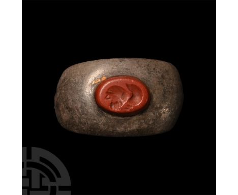 2nd century A.D.. With applied jasper stud bearing an intaglio profile bust of Silenus; hoop incomplete. Cf. Ruseva-Slokoska,