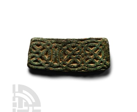 8th-9th century A.D.. Appliqué with dense interlace design and traces of gilding. Cf. Webster, L. &amp; Backhouse, J., The Ma