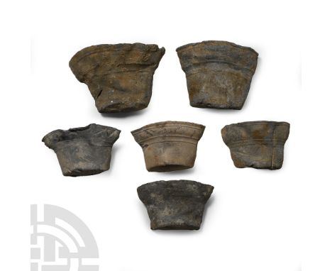 14th-15th century A.D.. D-shaped in section, bell-shaped containers, some with low-relief detailing; many of these objects ar
