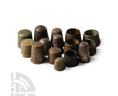 Circa 14th-20th century A.D.. Including annular, beehive and other types with irregular dimples.  65 grams total, 12-25 mm (1