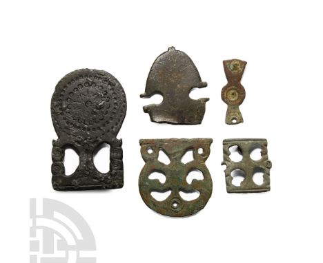 4th-5th century A.D.. Comprising: an amphora-shaped strap end decorated with rings and dots, the centre ornamented by a star 