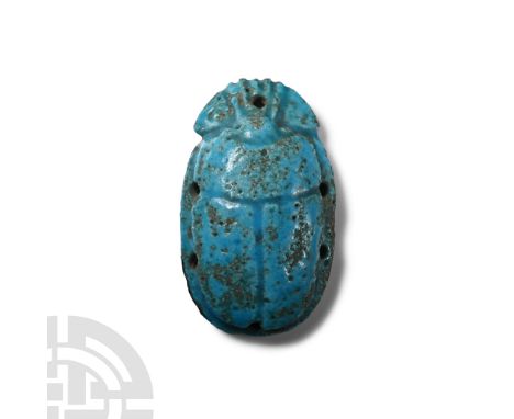 750-332 B.C.. With boldly indicated head, clypeus, prothorax, and elytra; flat underside; holes at the head, back, and sides 