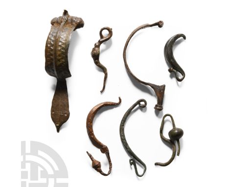 1st century B.C.-2nd century A.D.. Including Colchester type, La Tène I type, dolphin type and others. Cf. Hattatt, R., Iron 