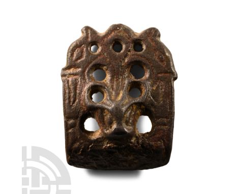 11th century A.D.. Of Williams's Class B Type 3 Group 1 with openwork plaque, bear-head beneath two opposed wolf-heads, angle