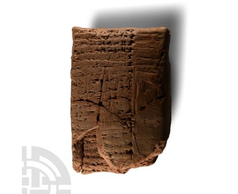 20th-19th century B.C.. Pillow-shaped ceramic tablet with impressed cuneiform text; within its original envelope with impress