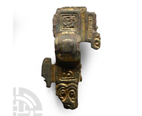 6th century A.D.. 'Florid' type with square panel of Style I ornament to the headplate and fragment of one lateral lug with b