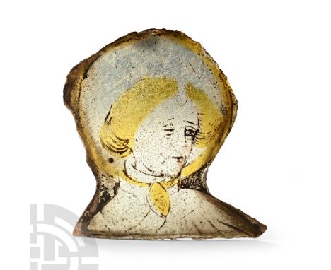 Western France, 15th century A.D.. Portrait bust of John the Evangelist with vesica-shaped brooch at the chest, nimbus behind