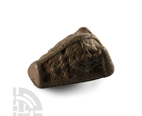 10th-11th century A.D.. Decorative upper surface attached to a plain back-plate with spring-lugs and catchplate intact; the u