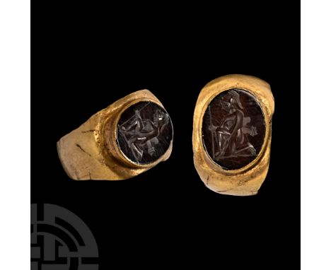 2nd-3rd century A.D.. With flared shoulders and ellipsoid cell, inset carnelian intaglio warrior kneeling on a baseline, Pseu