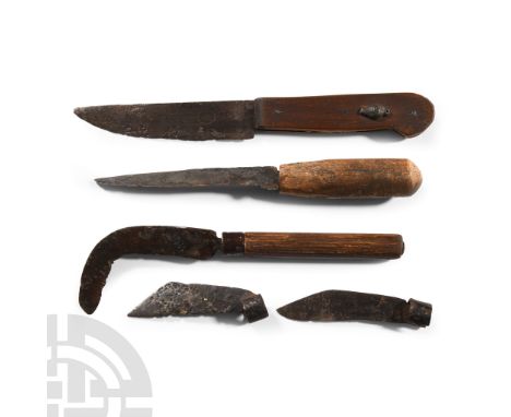 14th-17th century A.D.. Comprising: single-edged knife with swept edge, whittle-tang handle; single-edge knife with scale-tan