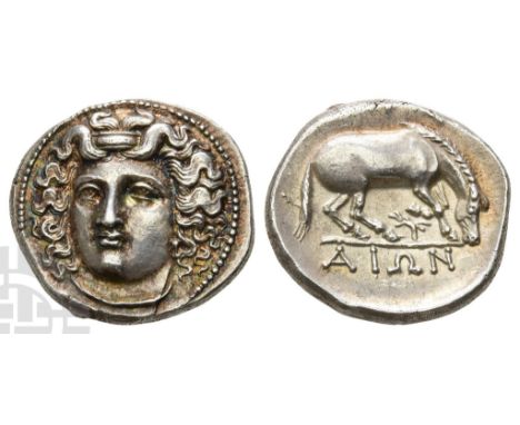 Circa 356-342 BC.. Head of the nymph Larissa facing slightly to the left, wearing ampyx, pendant earring, and simple necklace