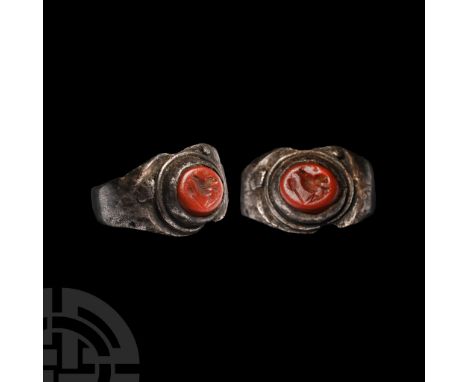 2nd-3rd century A.D.. With broad hoop, plaque with cell and applied wire collar, inset jasper cabochon with intaglio bird and