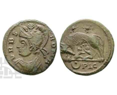 AD 330-354.. VRBS ROMA, bust of Roma to left, wearing crested helmet and imperial mantle / She-wolf standing to left, sucklin