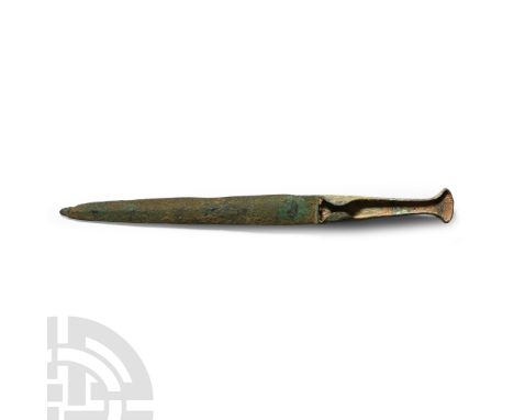 13th century B.C.. With lentoid-section blade, tongue-shaped in plan, with integral tapering hilt with flared finial, lateral