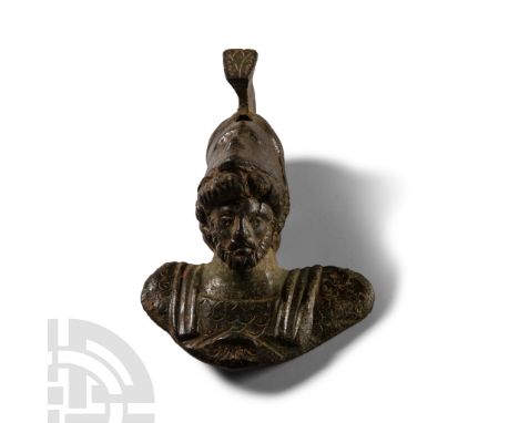 Circa 2nd-3rd century A.D.. Highly detailed bearded head with thick hair locks surmounted by a pseudo-Corinthian helmet with 