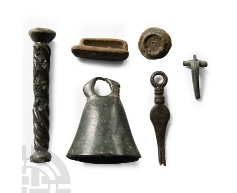 1st-4th century A.D.. Including a miniature T-shaped brooch, nail-cleaner, enamelled military belt mount and other items; man