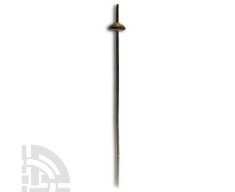 2nd millennium B.C.. Distaff with spiral slot to the thicker end, separate domed whorl and tapering shank. Cf. Grütter, N., ‘