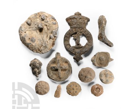 Circa 14th-19th century A.D.. Including bag seals, janiform figure's head, palm guard and other items; many of these objects 