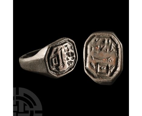 Circa 16th century A.D.. With octagonal plaque and chamfered edges, incuse design including an arrow and enigmatic pseudo-tex