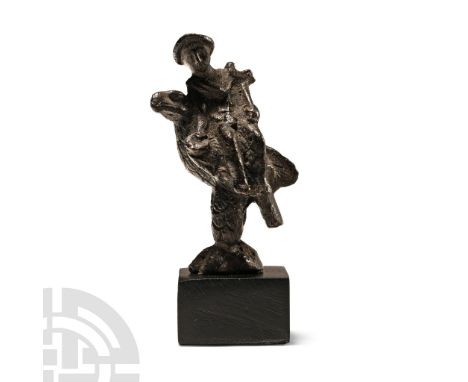 2nd century A.D.. Modelled in the round as a figure of an eagle perching with its head turned to the right; on its back, the 