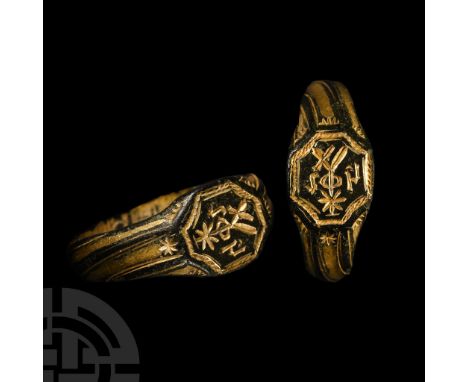 15th century A.D.. With wreath detailing to the shank, octagonal plaque bezel with merchant's mark and blackletter 'i h' flan