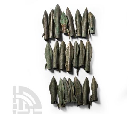 Circa 7th-3rd century B.C.. Each with a slender, lozenge-shaped blade and a socket extending near the tip, base of the socket