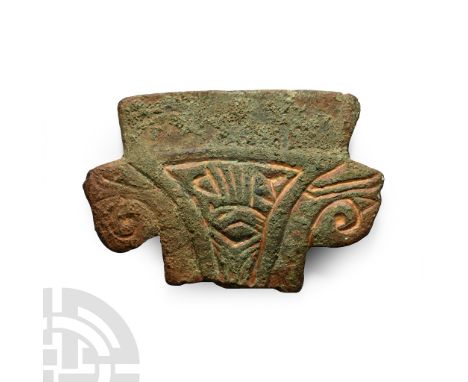 6th century A.D.. Fragment from the foot with trapezoidal plain panel, lateral avian heads and pelta-shaped panel of Style I 