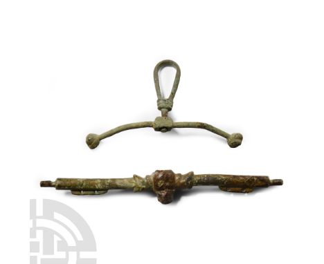15th-16th century A.D.. Including one with elongated suspension loop, one with central bulb and lateral pierced flanges. Cf. 