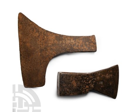 17th-18th century A.D.. Comprising a large side-axe with wide chin; a substantial felling axe with punched maker's mark 'K' t