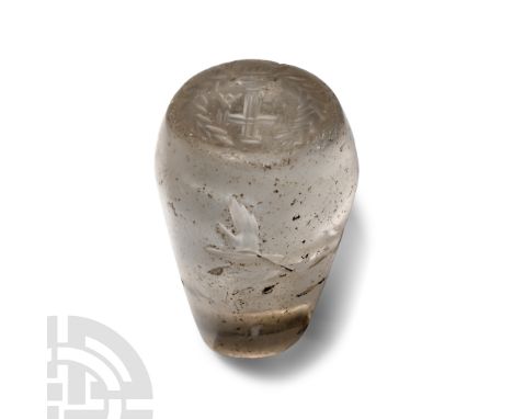 6th-8th century A.D.. Piriform amuletic pendant with manus dei 'hand of God' motif to the side and wreath to the underside en