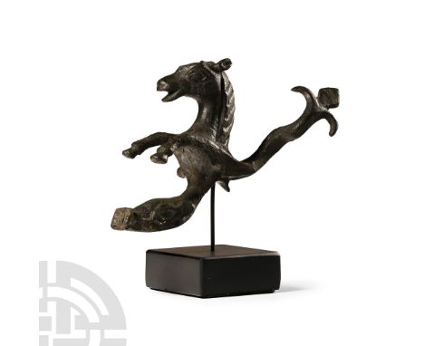 2nd-3rd century A.D. or later. Comprising a hippocampus with raised head, arched neck and forelegs extended, curved body coil