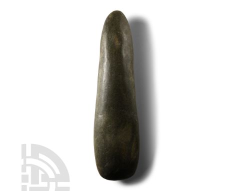 Neolithic Period, circa 4th-3rd millennium B.C.. With rounded cutting edge, lentoid cross-section and domed butt. Cf. MacGreg